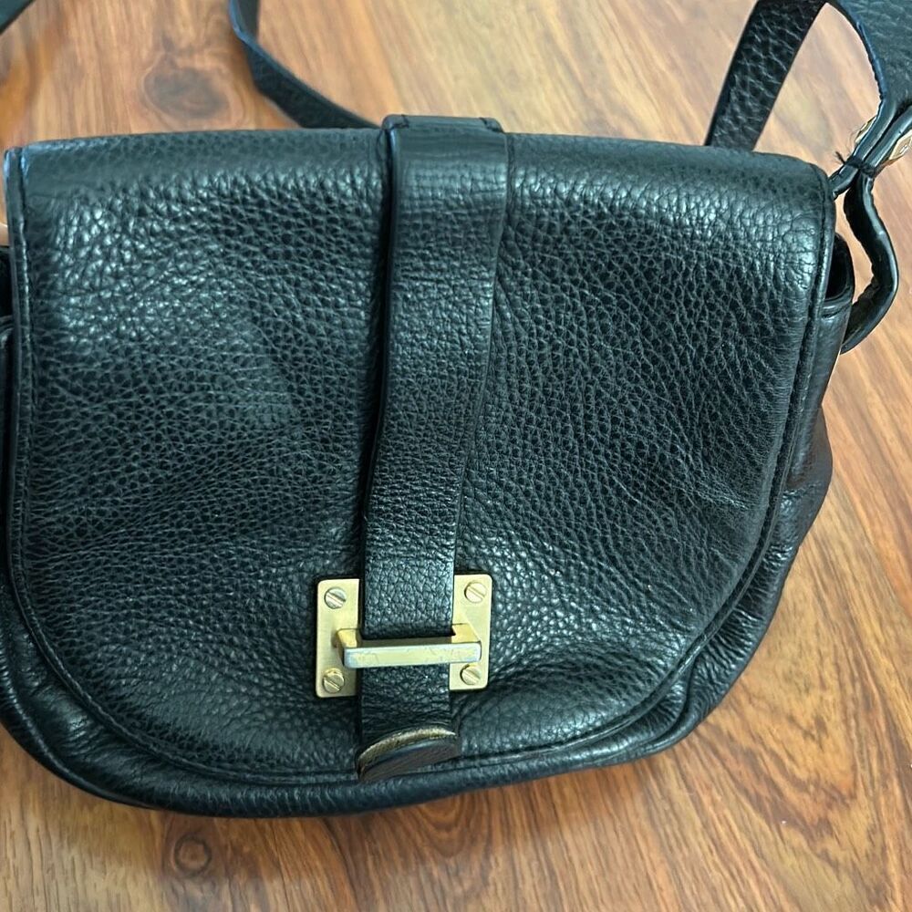 Vintage Henri Bendel black pebbles leather Crossbody bag.